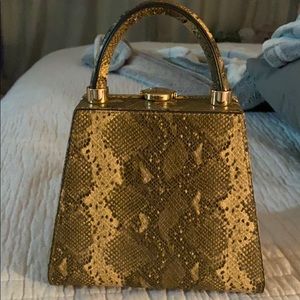 Amal Faux leather handbag